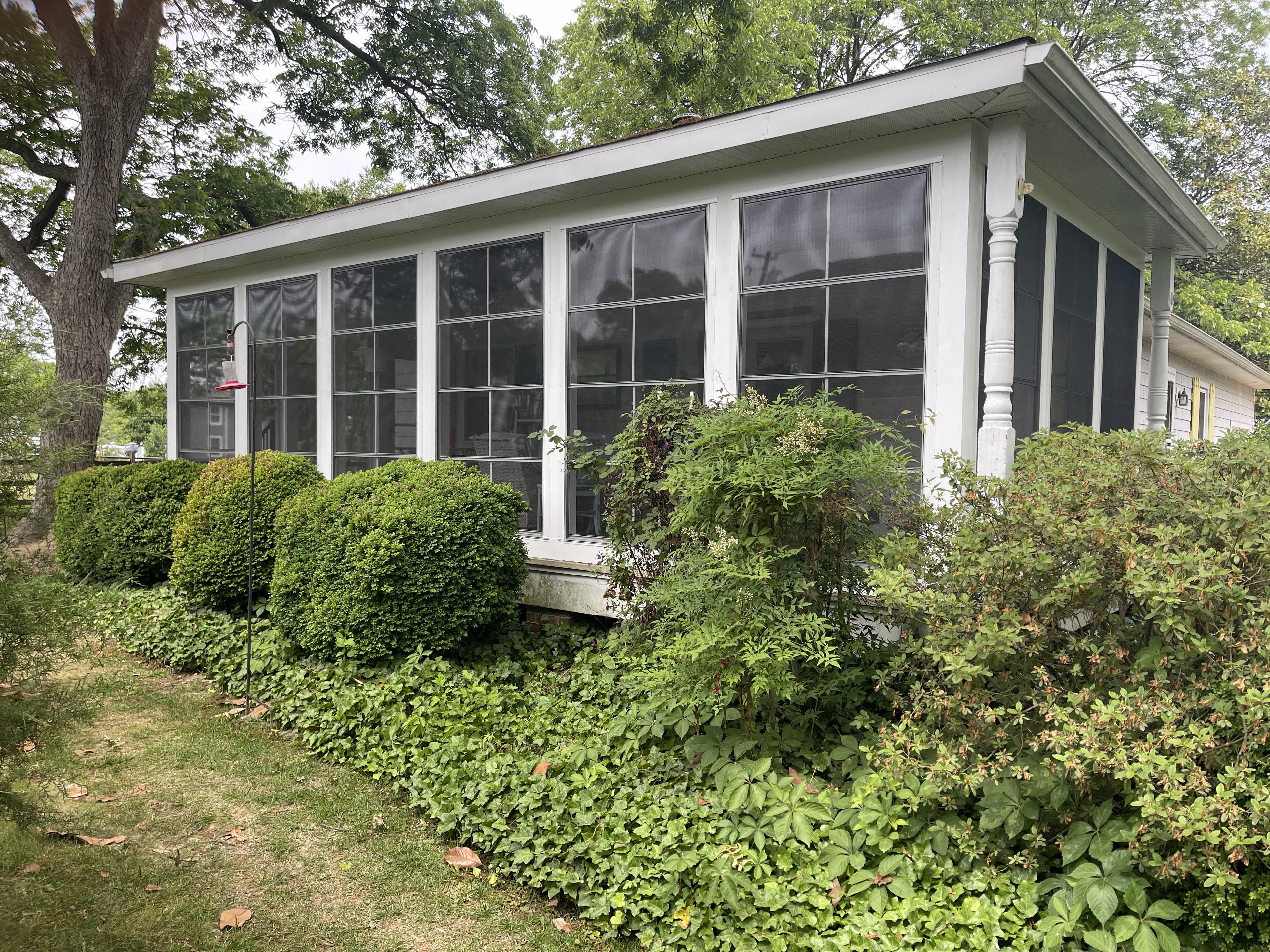 Exterior of the 303 Bonfield porch after renovation