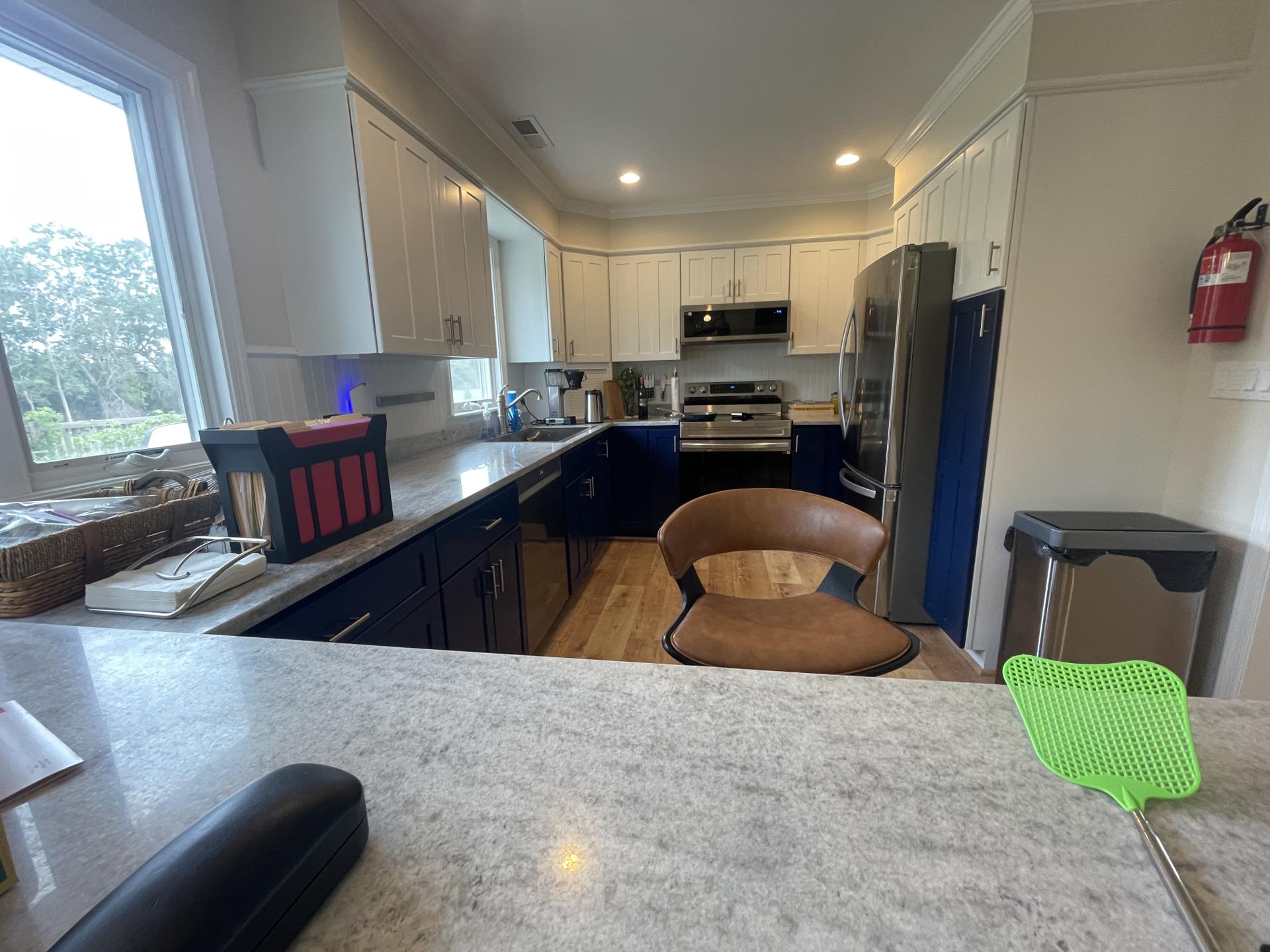 Kitchen Refresh with Custom Cabinet Refinishing & New Stone Countertops