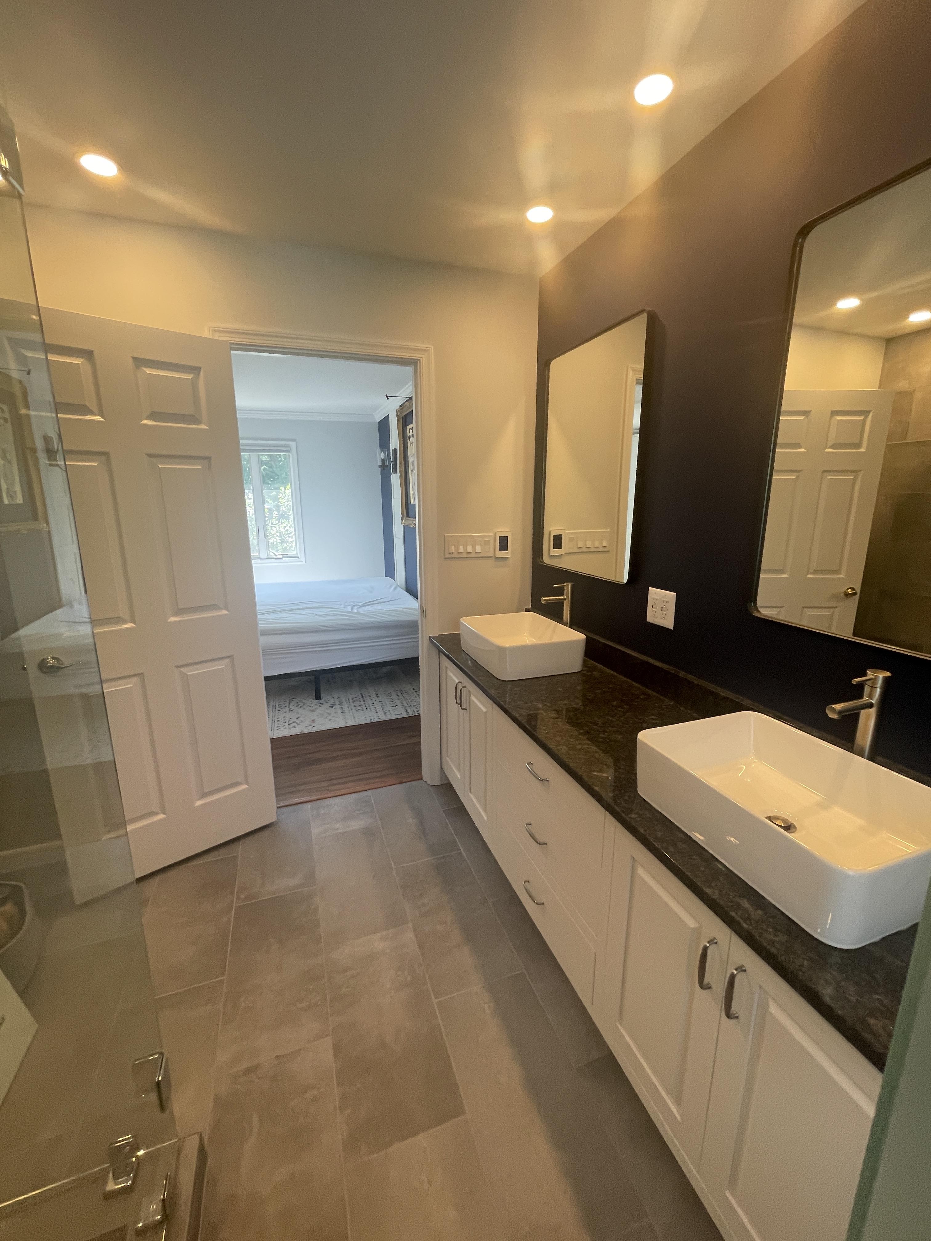 Master bath after remodeling with updated vanity and finishes